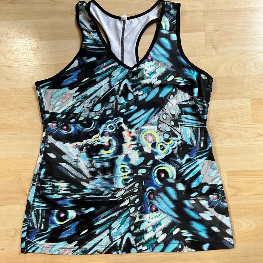 4 exercise tops, 3 are dri-fit type material, wine is cotton.